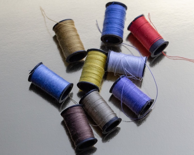 Colourful sewing thread spools